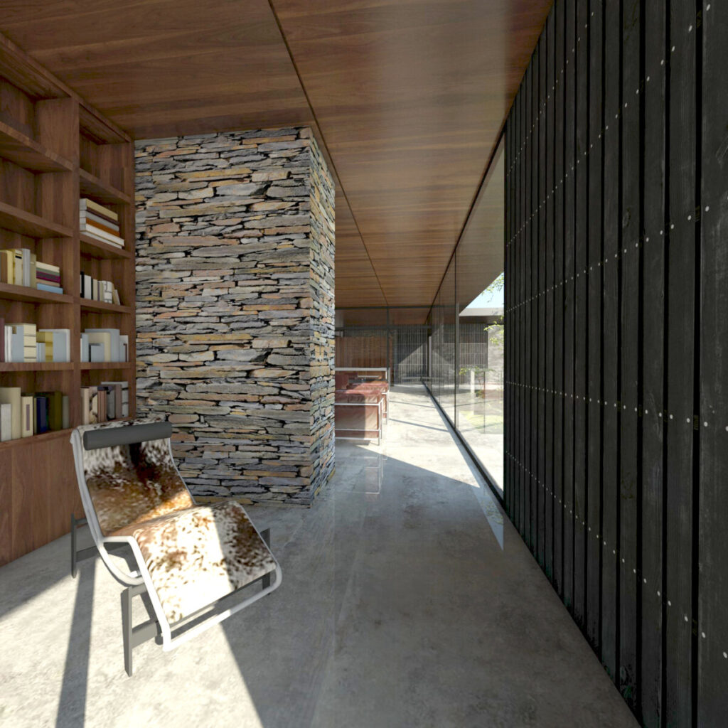 Salon et bibliothèque en bois avec cheminée pierres anciennes, sol béton quartzé.